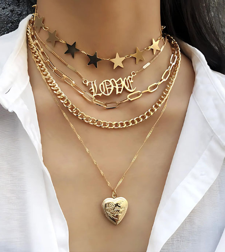 layered gold chain necklaces and pendants, front view