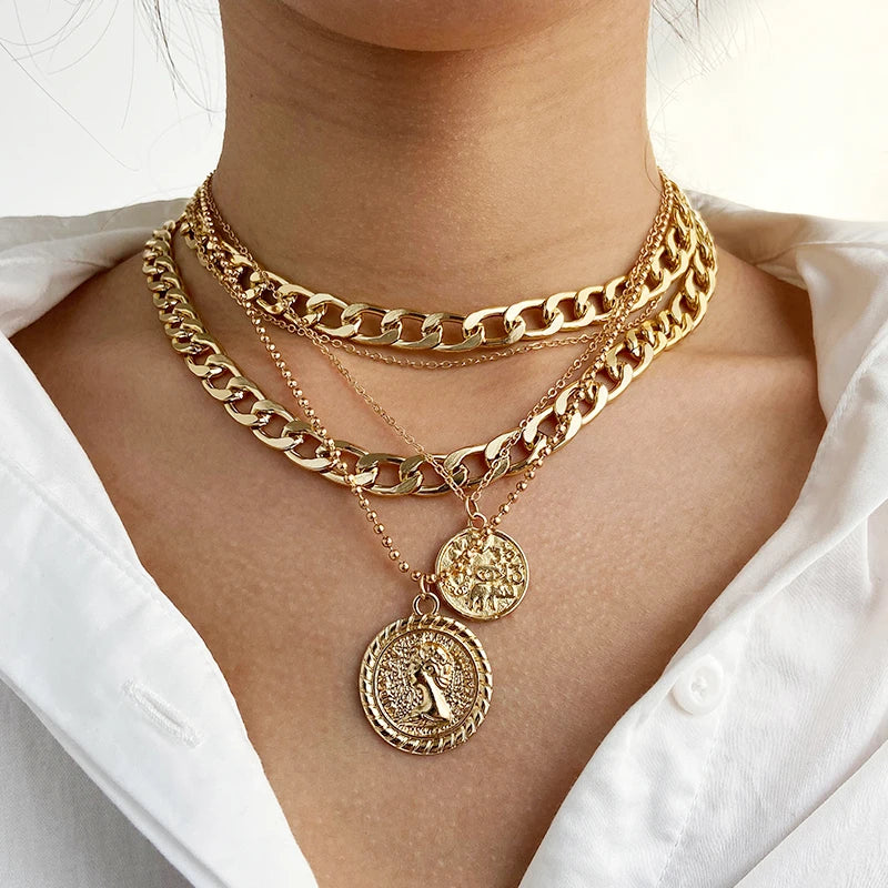 womens gold cuban link, medallion pendant, front view
